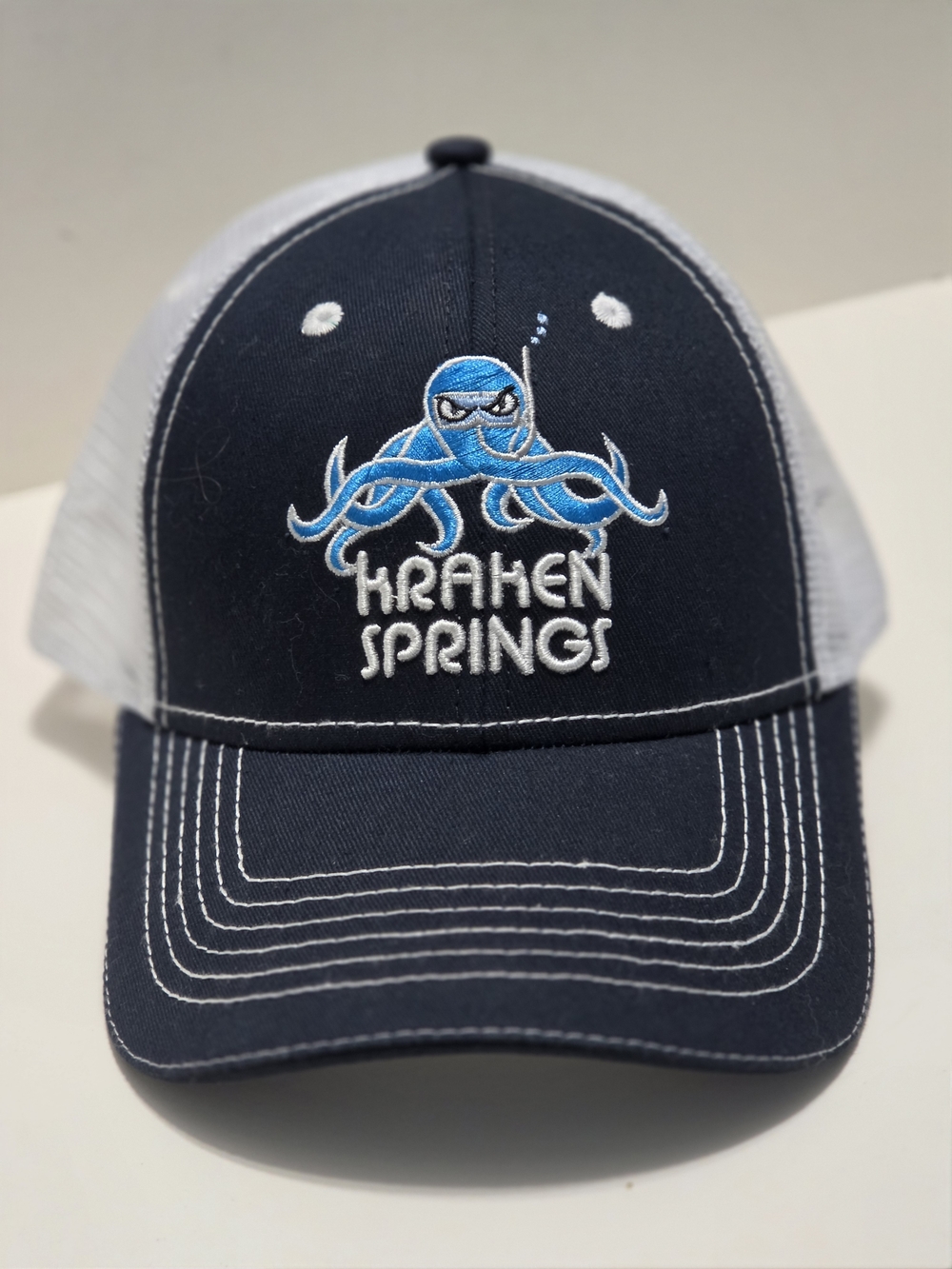 Kraken Springs Embroidered Blue/White Trucker Hat